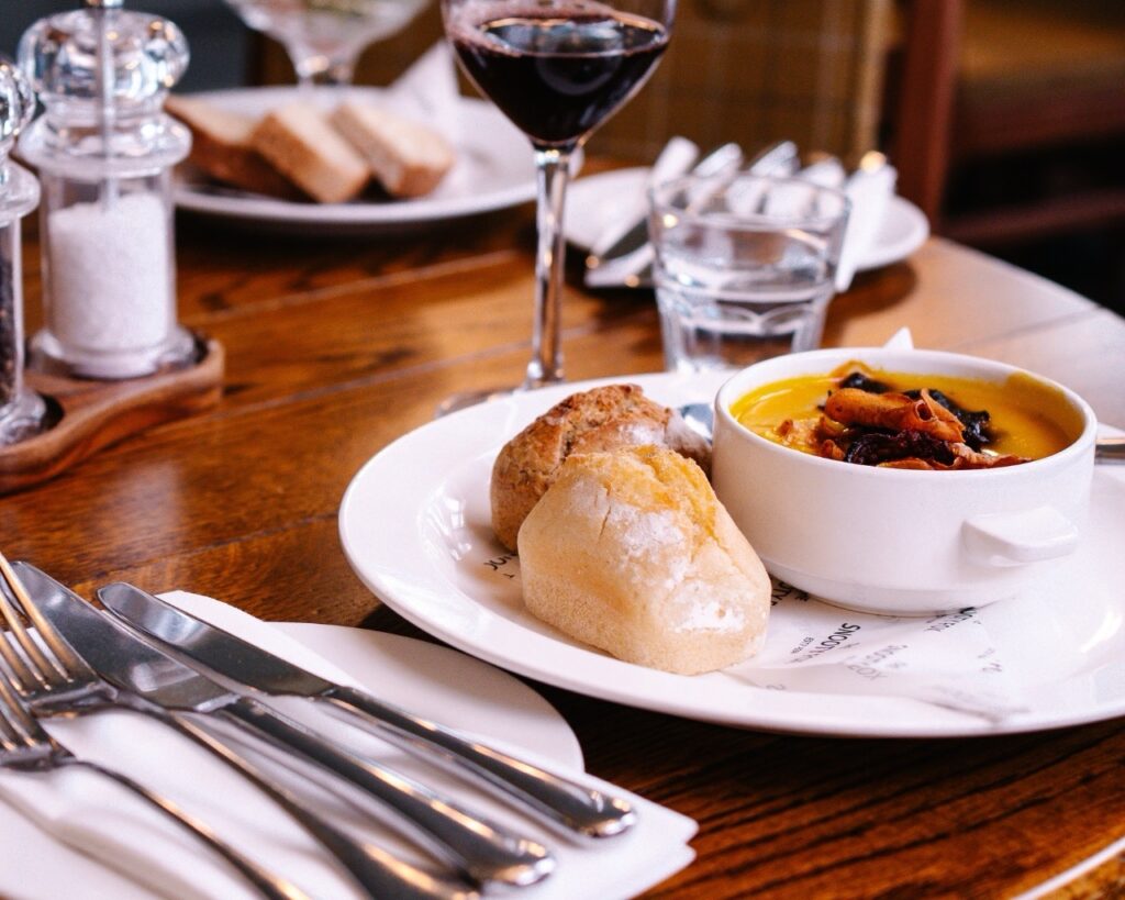 Vegetable soup with veggie crips topping served at the snooty fox during the autumn package stay